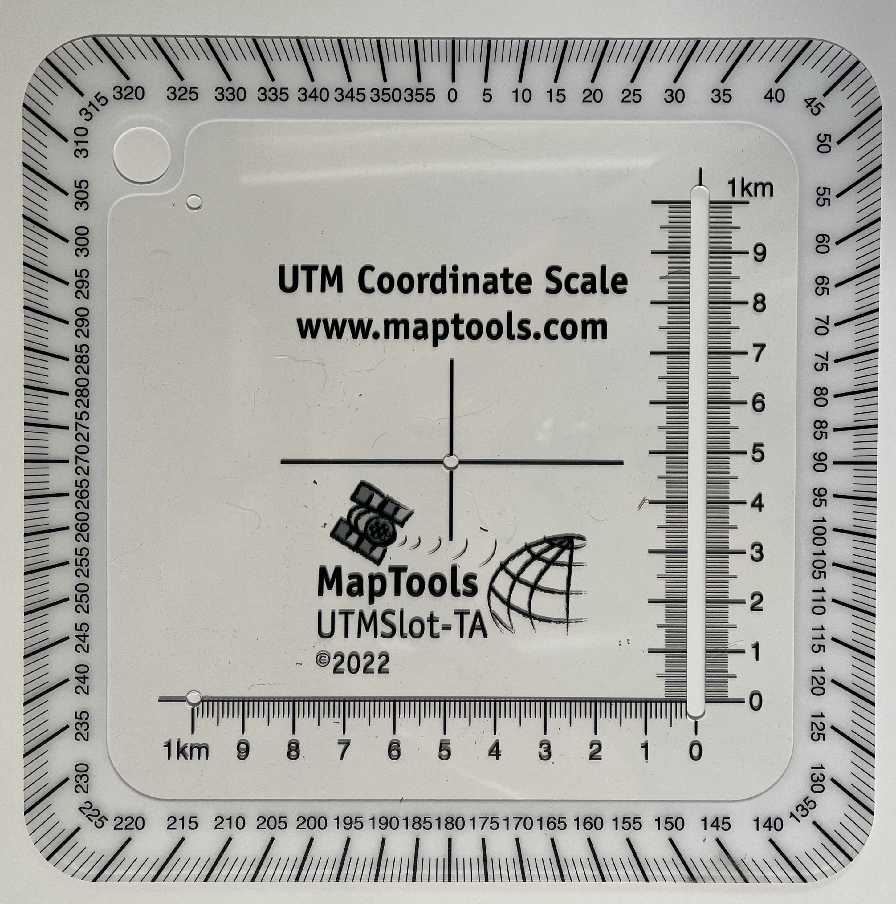 Slot tool measuring coordinates of a point